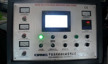 Manipulez la machine de fabrication de sac plat/machine non tissée ultrasonique de sac